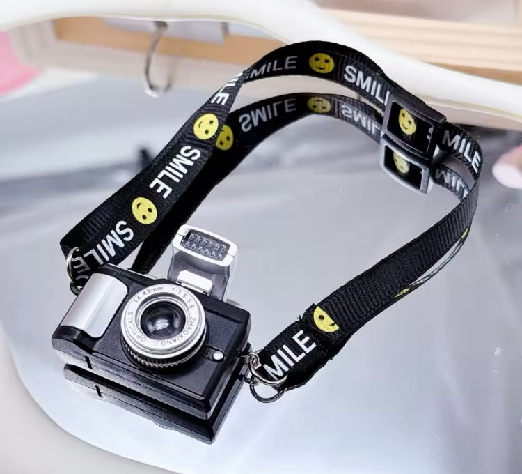 Cámara fotográfica para muñeco bubu con flash color negro COS0102