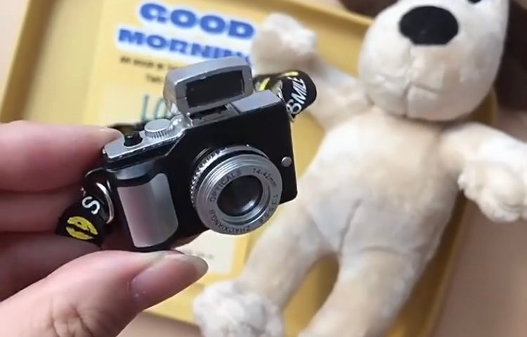 Cámara fotográfica para muñeco bubu con flash color negro COS0102