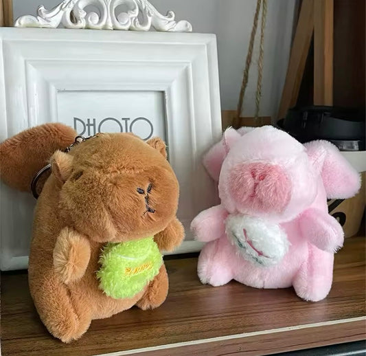 Llavero peluche Capibara con pelota de tenis con alas 🪽 vibratorias (J2)  222222