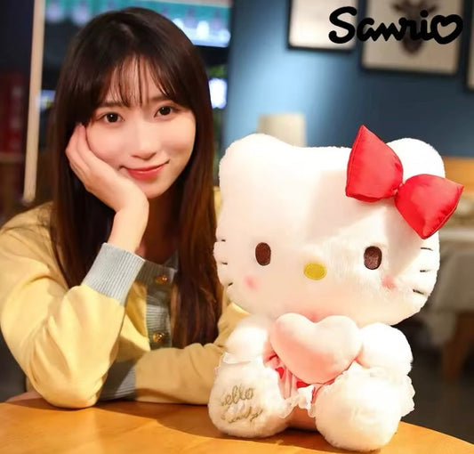 Peluche HK con moño y corazón rosa  30 cm MR-1230