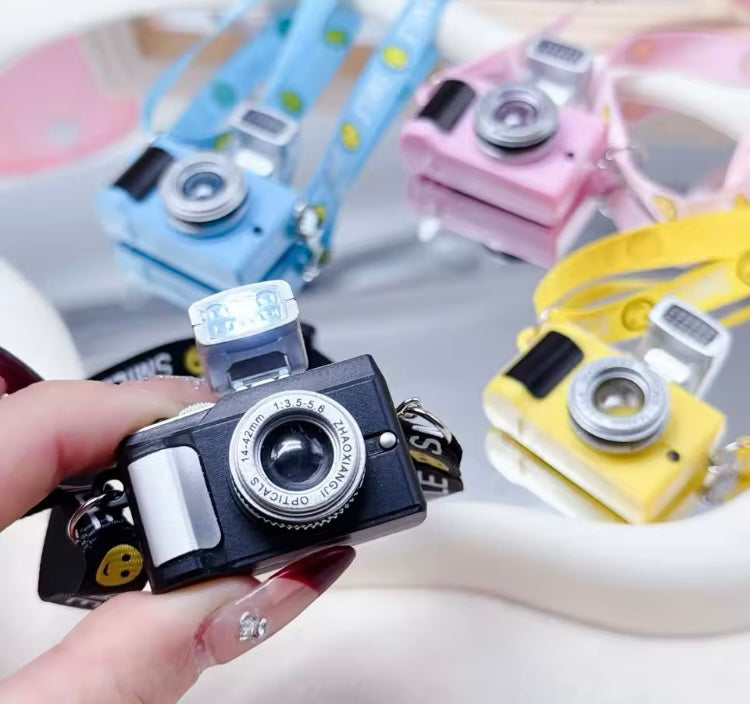 Cámara fotográfica para muñeco bubu con flash color negro COS0102