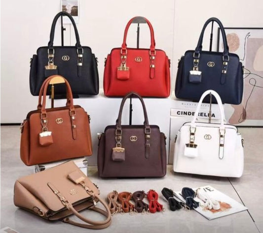 Bolsa para dama YJR-34 foto ilustrativa el modelo tiene una variante en la aza y una bolsa en la parte frontal.. (A3)