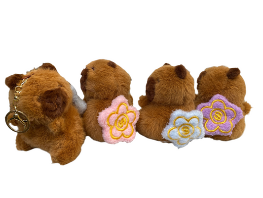 Llavero peluche Capibara de cuerda con flor 🌺 en la espalda modelo R1105