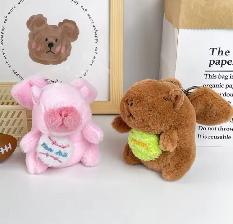 Llavero peluche Capibara con pelota de tenis con alas 🪽 vibratorias (J2)  222222